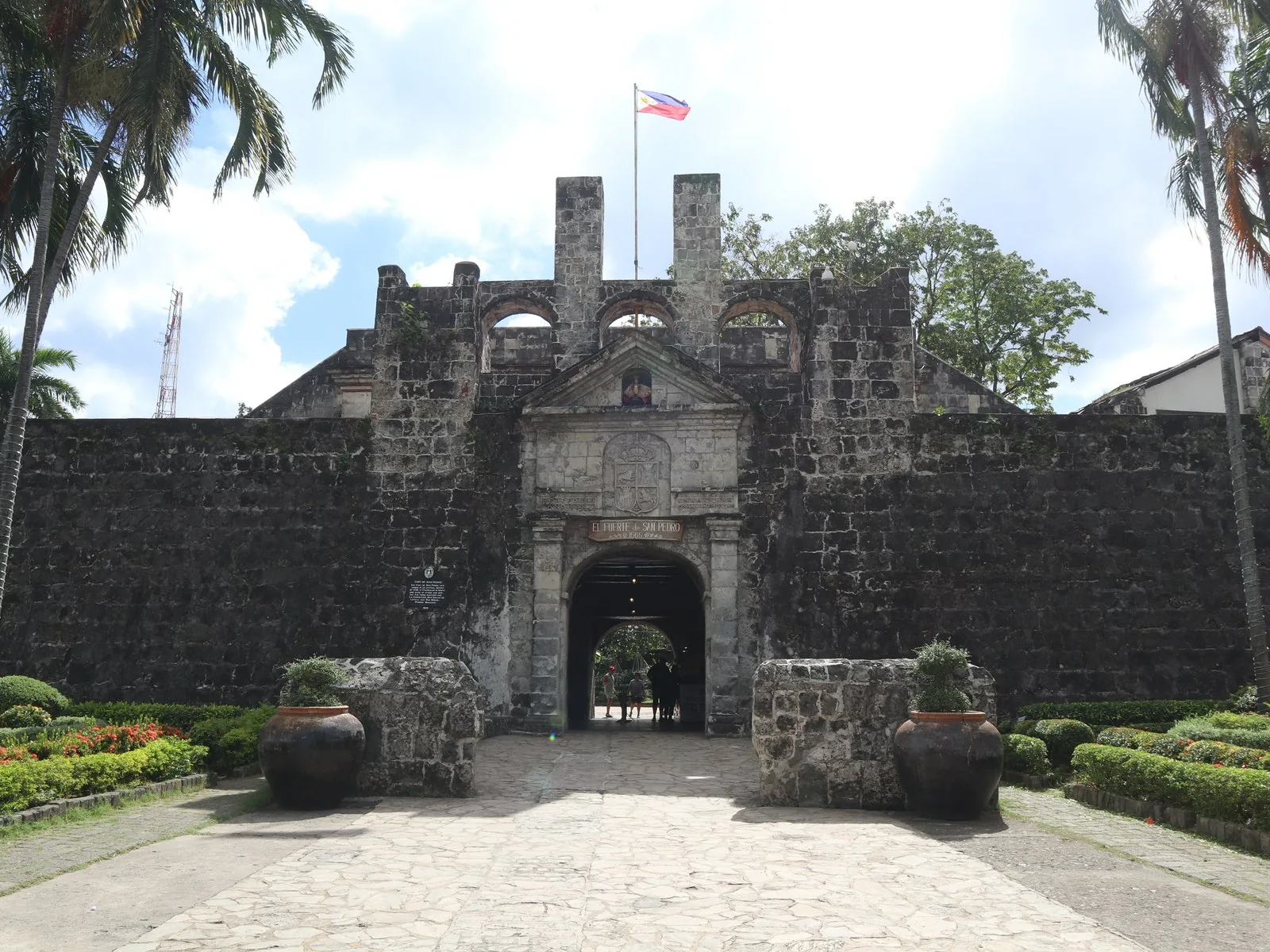 Fort San Pedro in Cebu City, with stone walls and palm trees